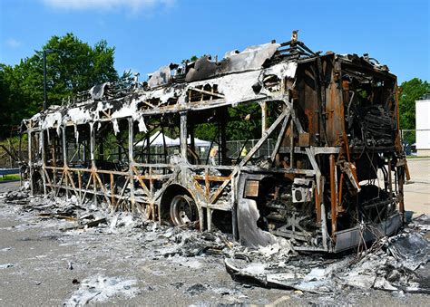 , NTSB officials say a 2021 New Flyer Xcelsior battery-electric bus began emitting smoke from the rear compartment while parked inside a maintenance facility in Hamden. . New flyer electric bus fire